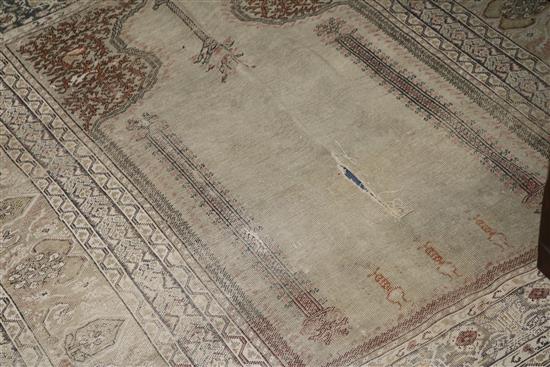 A Bokhara red ground rug and two Persian rugs (worn)